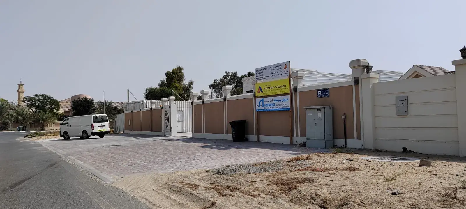Villa plot boundary wall and site access